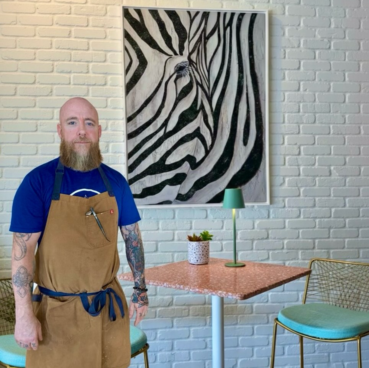 Chef Michael Luth plating a dish