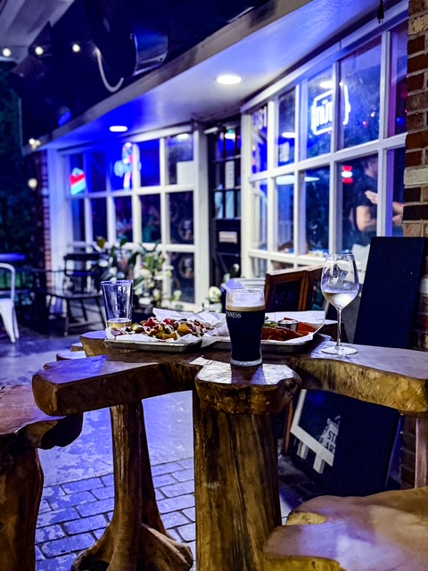 The Locals Pub patio at night - Tequesta's neighborhood bar